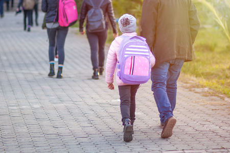 Group of kids going to school together, back to school, winter time.の写真素材