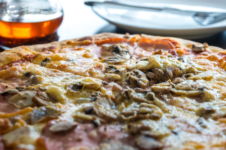 pizza on wooden board, The most delicious Italian cuisine, food.の写真素材