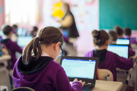 school children are participating actively in classの写真素材