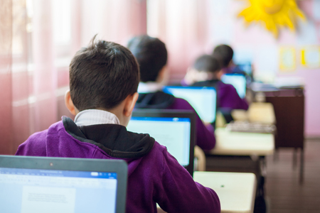 school children are participating actively in classの写真素材