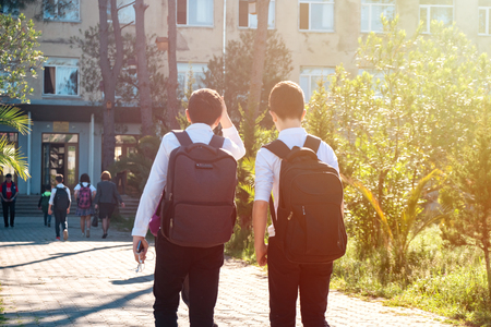 Group of kids going to school together, back to school, educationの写真素材