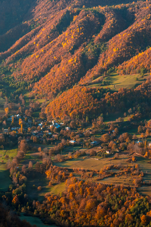 colorful trees in the mountains of Svaneti in the fall. Beautiful autumn landscapeの写真素材