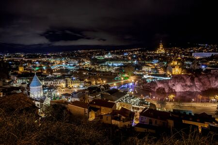 Night view of Tbilisi with Sameba (Trinity) Church and other landmarks. Beautiful Place to travel.の写真素材