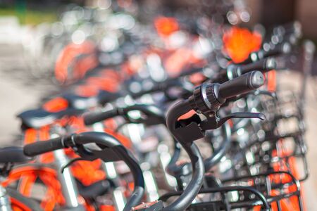 Rental and parking of pleasure bicycles in the city Milan in Italy. Transportation.