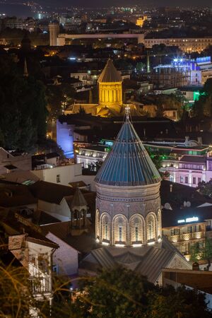 Top view of the Georgian capital Tbilisi at night. Travel.の写真素材