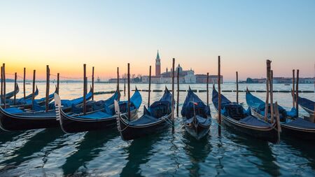 Sunrise in Venice, gondolas and island of St. George view from the square San Marco. Travel.の写真素材