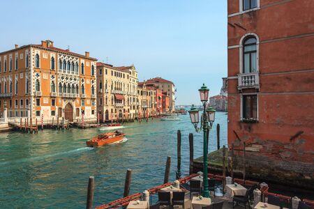View of Canal Grande. Various boats float by a fine architectural complex of embankments. Travel.の写真素材