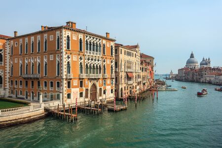 View of Canal Grande. Various boats float by a fine architectural complex of embankments. Travel.の写真素材
