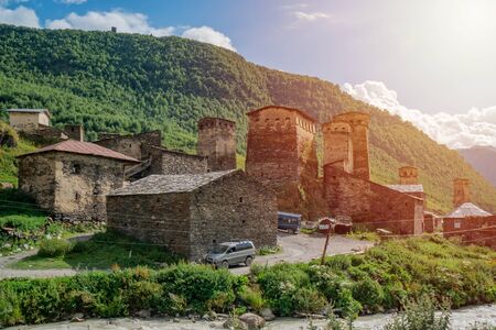 View of the Ushguli village at the foot of Mt. Shkhara. Picturesque and gorgeous scene. Rock towers and old houses in Ushguli, Georgia. Travel.の写真素材