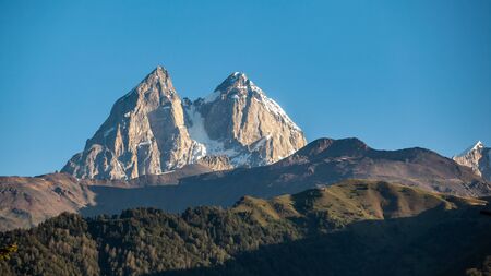 View of Mount Ushba. Ushba is one of the most notable peaks of the Caucasus range, located in the Svaneti region of Georgia. Travel.の写真素材