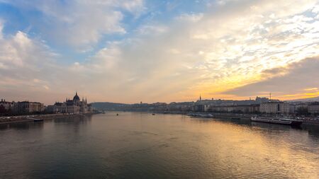 Incredible Evening View of Budapest parliament and Danube river at sunset, Hungary. Wonderful Cityscape with Colorful sky. Landscape.の写真素材