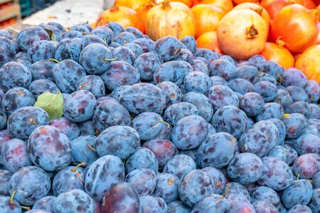 Blue plum fruits. Ripe Plums in a market. Fruiet.の写真素材