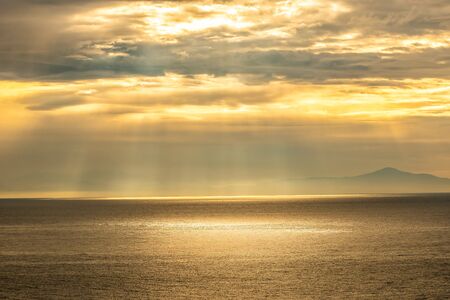 Sunset sky over calm sea in the evening. Nature.