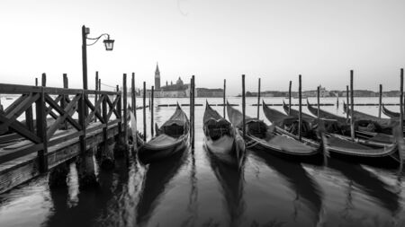 Sunrise at Venice with gondola and islandの写真素材