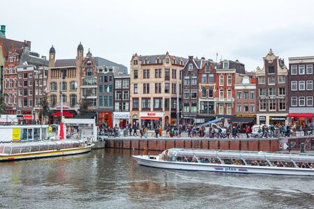 Amsterdam, Netherlands 15 October 2019. Amsterdam canals with boats and typical houses. Travel.のeditorial素材