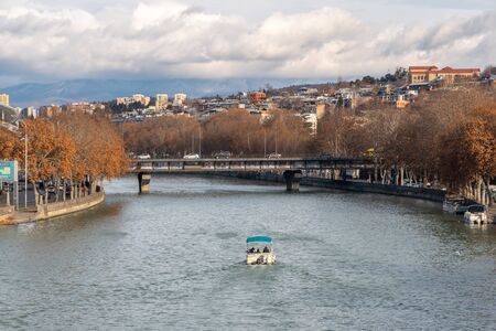 Tbilisi, Georgia 22 January 2020 - View of Kura river from bridge. Travel.のeditorial素材