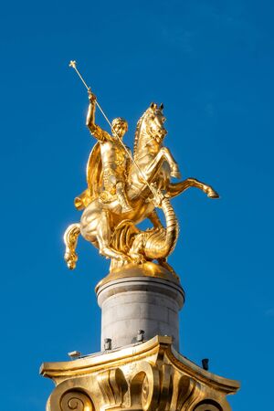 Golden sculpture of Saint George on the Freedom Square in Tbilisi, Georgia.のeditorial素材