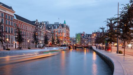 Amsterdam, Netherlands - October 14, 2019: Famous landscape in Amsterdam with unique building at...