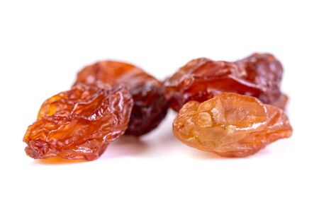 Raw raisins, dried grape isolated on white background. Dried fruitの写真素材