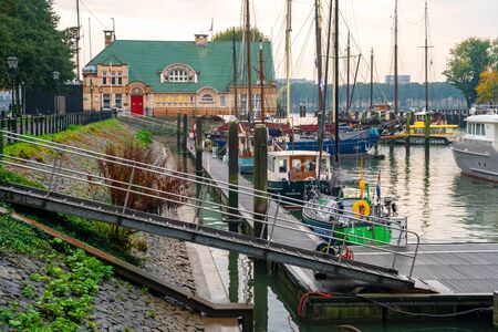 Rotterdam, Netherlands - October 13, 2019: Old boats and ships docked in the historic center. Travelのeditorial素材