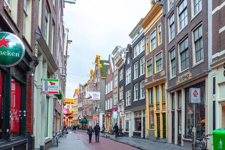 Amsterdam, Netherlands - October 15, 2019: Typical colorful buildings in Amsterdam, travelのeditorial素材