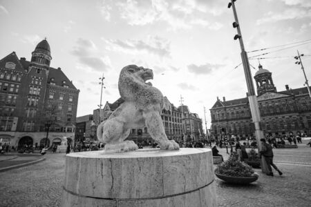 Amsterdam, Netherlands - October 14, 2019: Stone lion as part of The National Monument on Dam Square in center of Amsterdamのeditorial素材