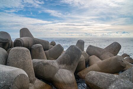 Breakwater of concrete tetrapods in Amalfi coastal town. Mediterranean Sea. Italyの写真素材