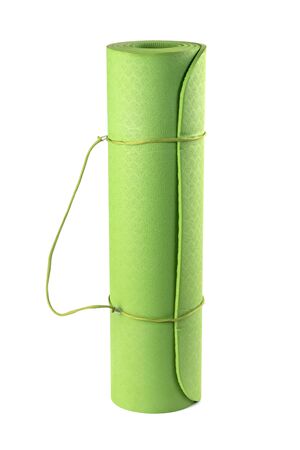 Green rolled sleeping mat isolated on white backgroundの写真素材