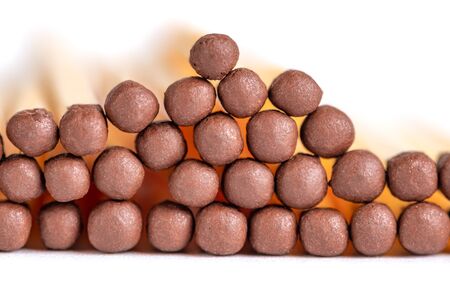 Wooden matches with sulfur for lighting a fire isolated on a white backgroundの写真素材