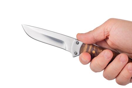 hunting knife in a hand isolated on white background, danger