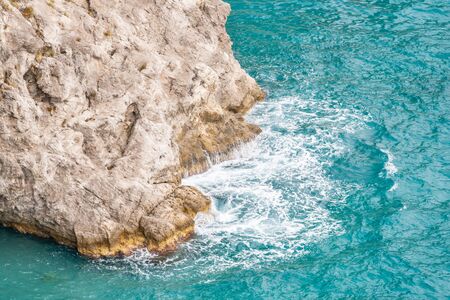 Splashing wave on the shore, Amalfi coast, Italy