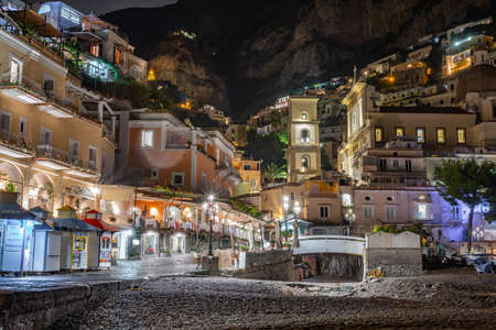 Rome, Italy - 1 November, 2019: Colorful houses of Positano along Amalfi coast at night, Italy. Night landscape. Landmark, tourismのeditorial素材
