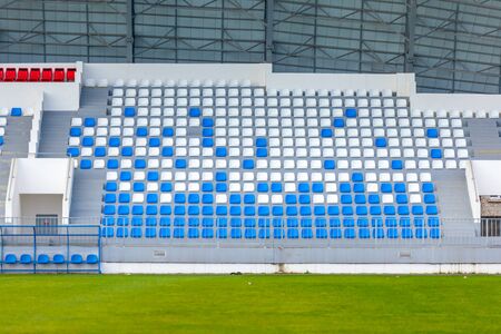 blue and white rows of seats on the stadium, sportの写真素材