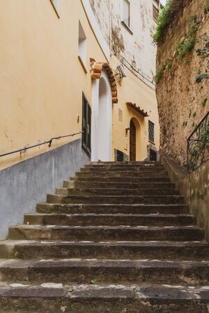 Narrow stairs and streets in the tourist village of Positano, Amalfi coast, travel to Italyの写真素材