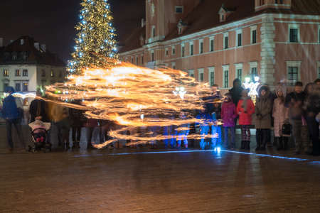 Warsaw, Poland - January 1, 2019: Fire dancing show fireball show amazing at night, travelのeditorial素材