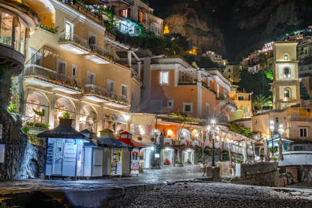 Rome, Italy - 1 November, 2019: Colorful houses of Positano along Amalfi coast at night, Italy. Night landscape. Landmark, tourismのeditorial素材