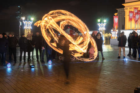 Warsaw, Poland - January 1, 2019: Fire dancing show fireball show amazing at night, travelのeditorial素材