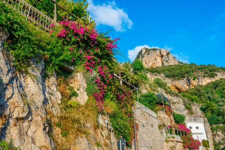 Typical narrow street and colorful houses in city of Positano, Amalfi coast, travelの写真素材