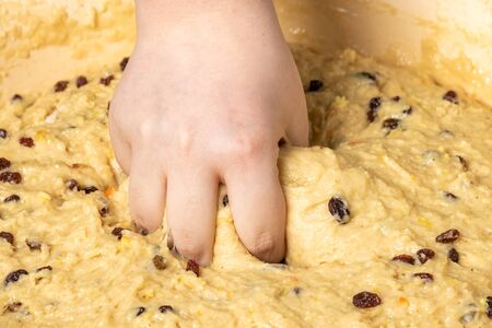 The confectioner prepares the dough, bread, cakes. Preparation with flour easter cake