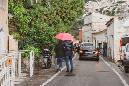 Positano, Italy - 2 November, 2019: Typical narrow street and colorful houses in city of Positano, Amalfi coastのeditorial素材