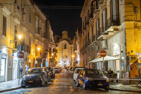 Bari, Italy - 06 November, 2019: Narrow streets of old city Bari at night, Italyのeditorial素材
