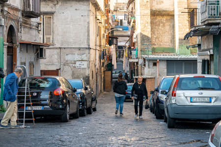 Naples, Italy - 30 October, 2019: Old dirty streets of Naples, people activity. Travelのeditorial素材