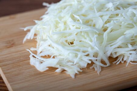 Sliced cabbage on a wooden cutting board, vegetableの写真素材