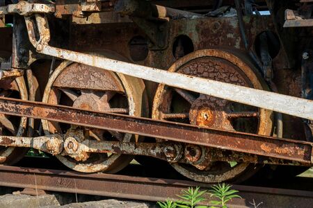 Details of the old rusty train locomotive, wheelの写真素材