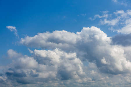 Blue sky background with white clouds, nature, textureの写真素材