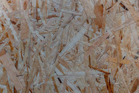 close up pressed wooden panel background - OSB wood