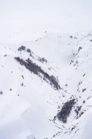Snowy winter mountains in Georgia. Caucasus Mountains