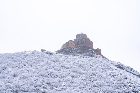 View of Jvari Monastery near Mtskheta in winter. Travel