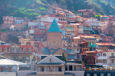 Tbilisi, Georgia - 03 April, 2021: Colorful traditional houses with wooden carved balconies in the Old Town of Tbilisi.のeditorial素材