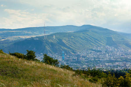 Beautiful view of Tbilisi at sunset, capital of Georgia. Citiyscape